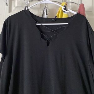Black shirt 4x but fits like a 3x
